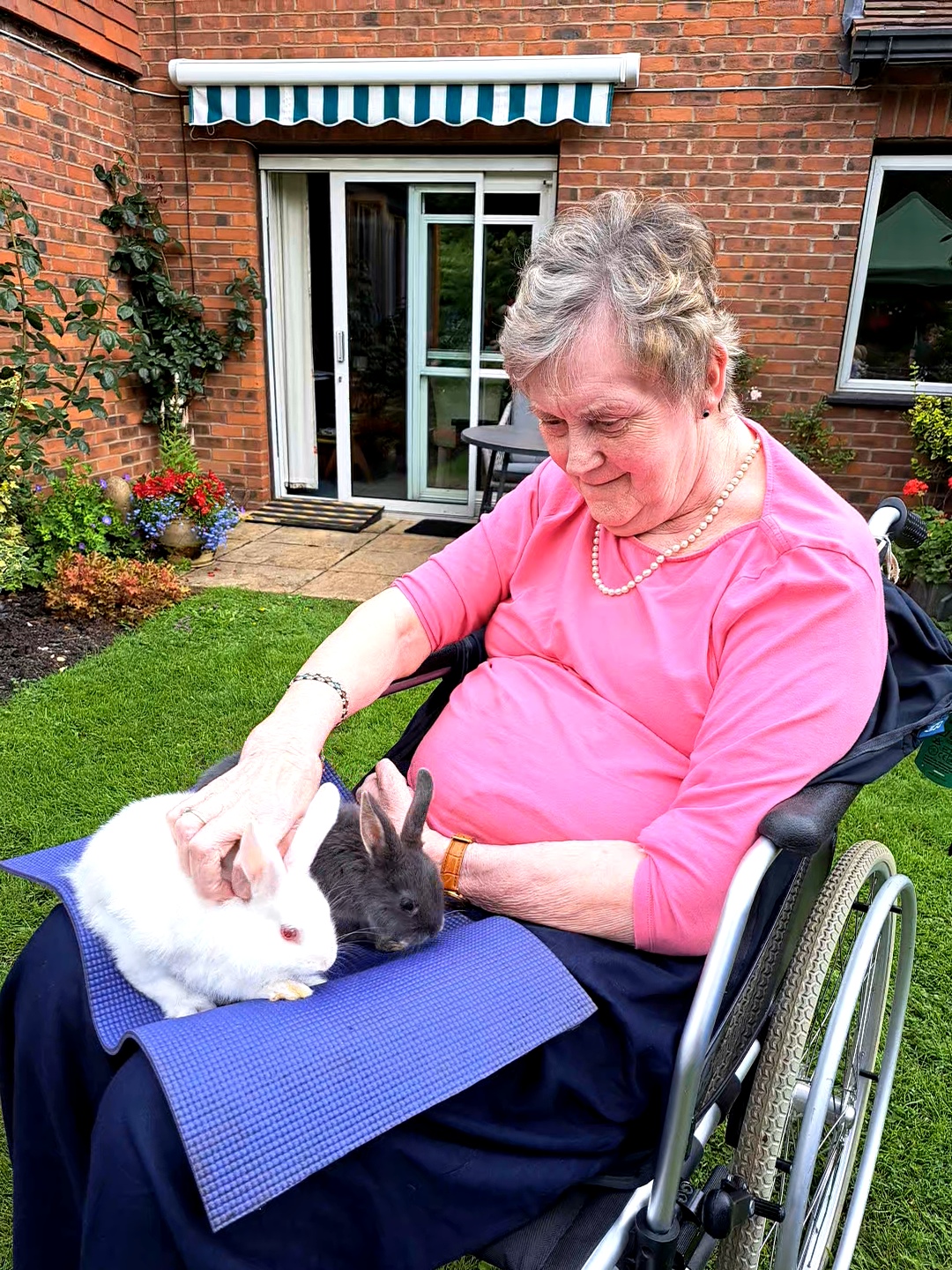 one of our residents enjoying cuddles